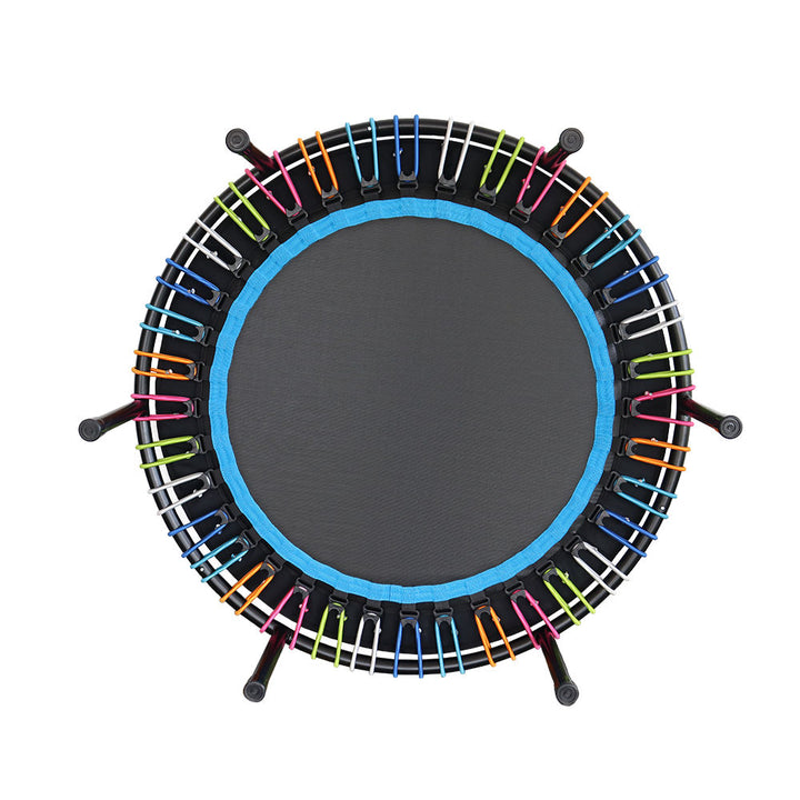 Small trampoline with colorful bungees on a white background