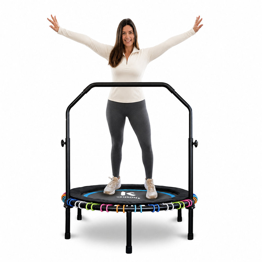 Woman standing on a 44 inch probounce rebounder with a white background
