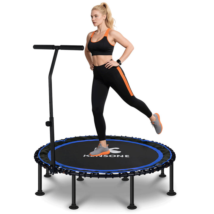 Woman exercising on a Kensone trampoline with a white background